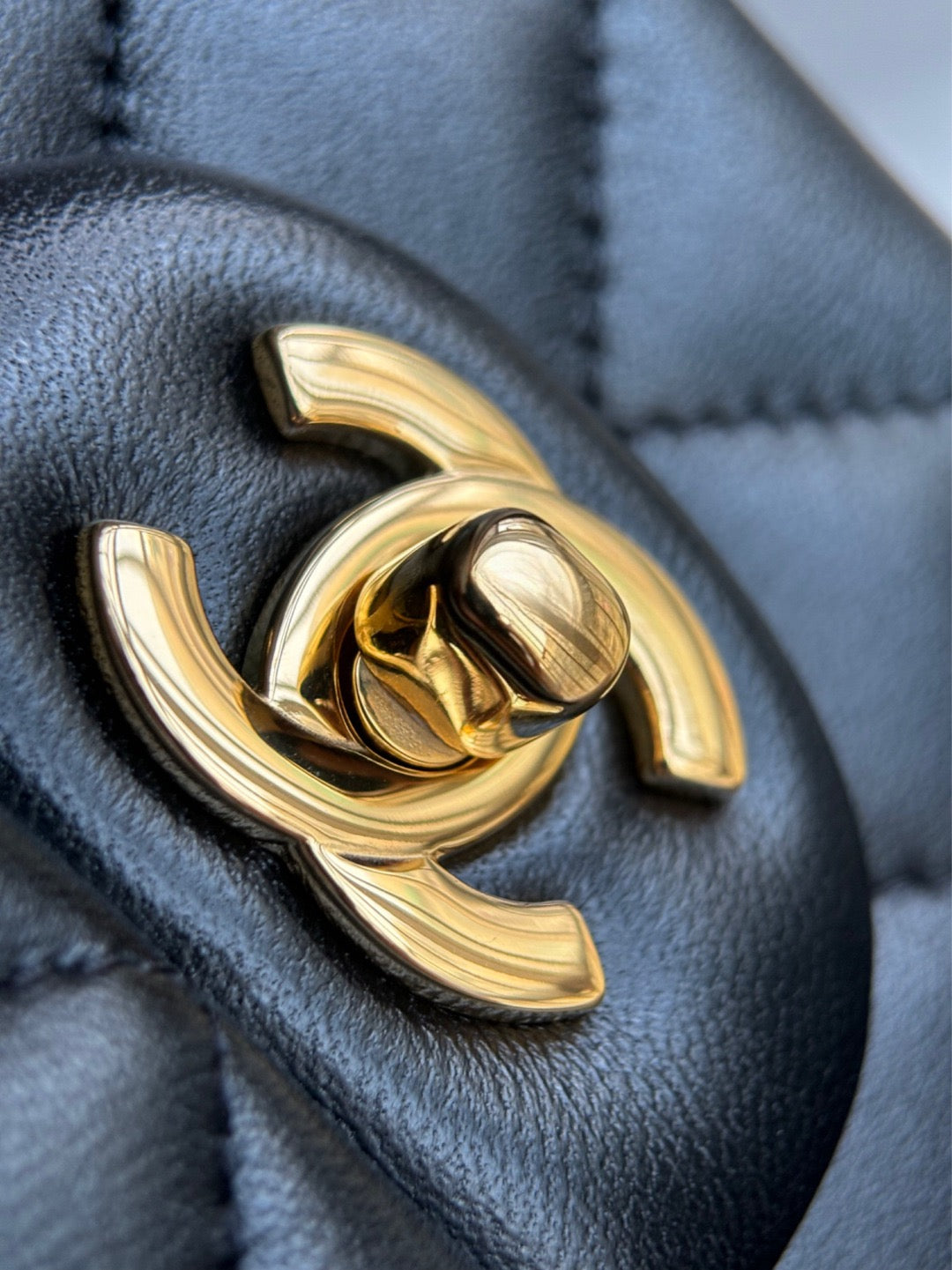 CHANEL- Flap23 bag golden/sliver