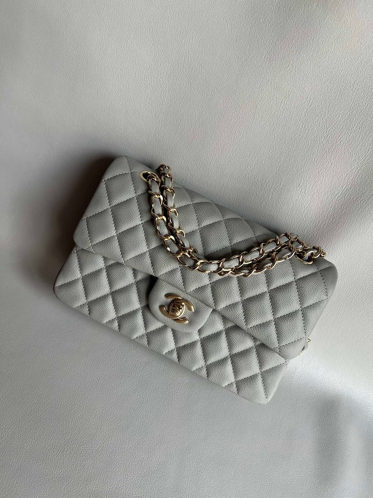 CHANEL- Flap23 bag golden/sliver