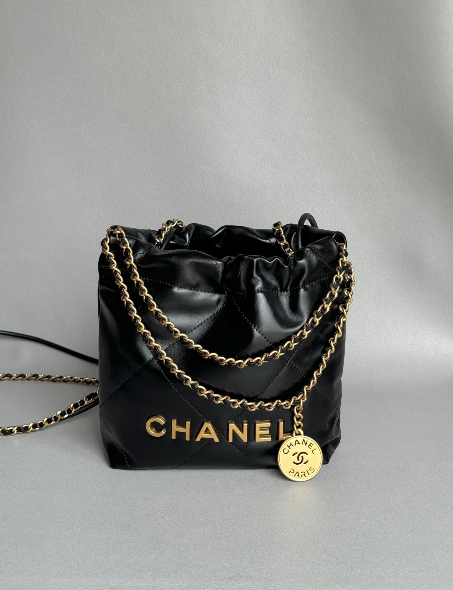 CHANEL-22bag mini golden/sliver