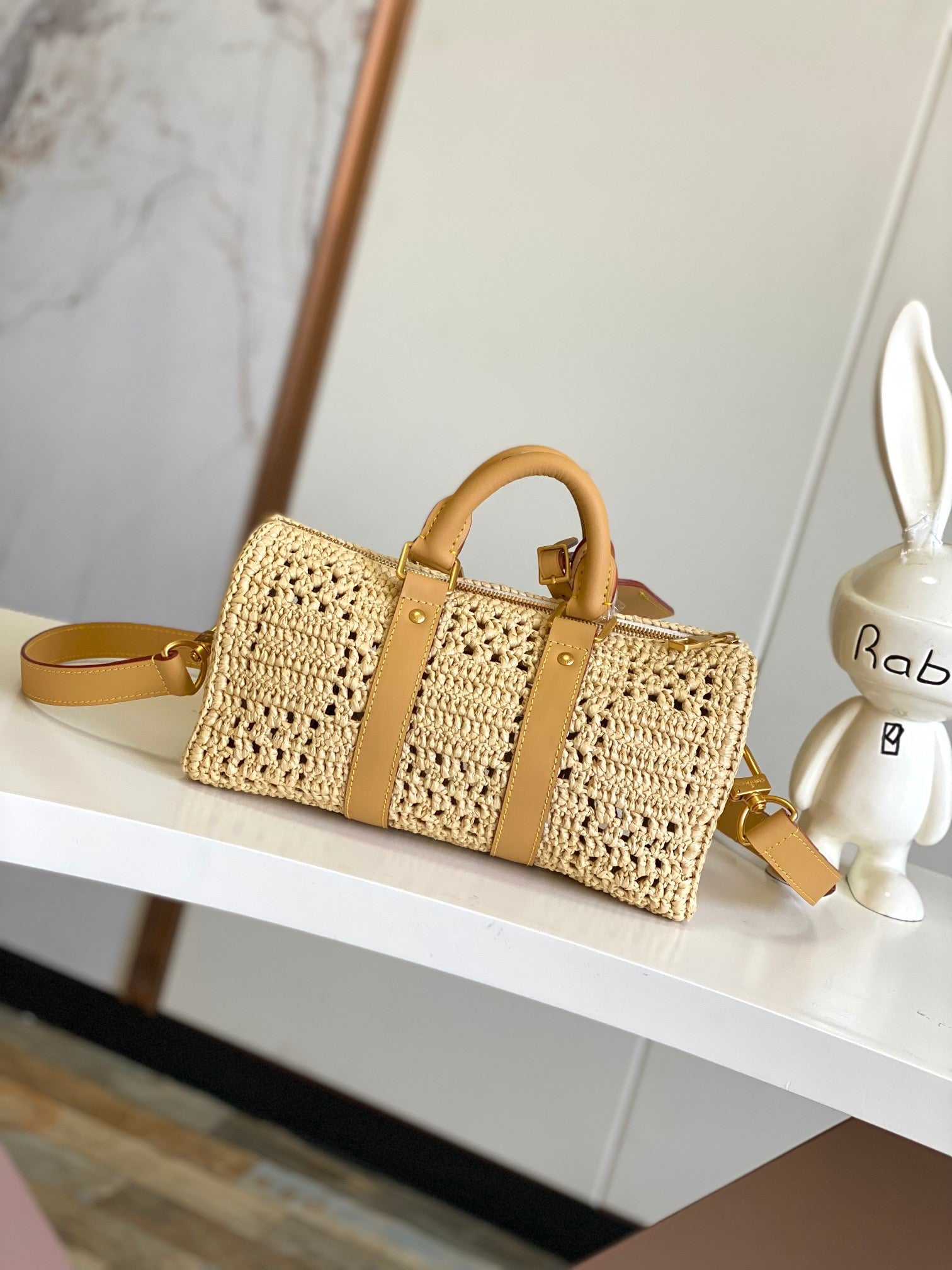 LOUIS VUITTON- Keepal Bandouliere 25 M25010