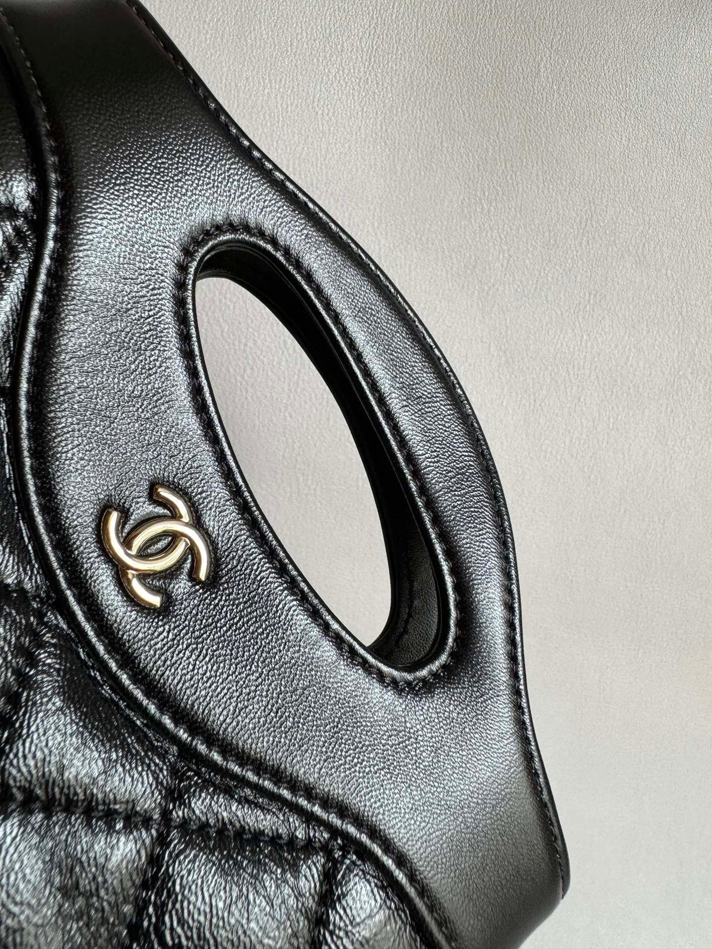 CHANEL-Nono 31 bag golden/sliver