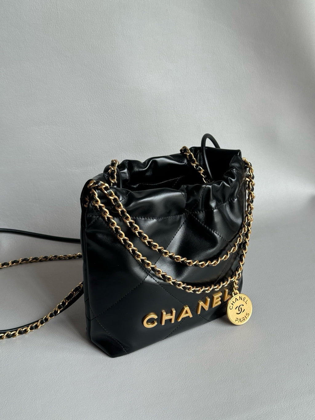 CHANEL-22bag mini golden/sliver