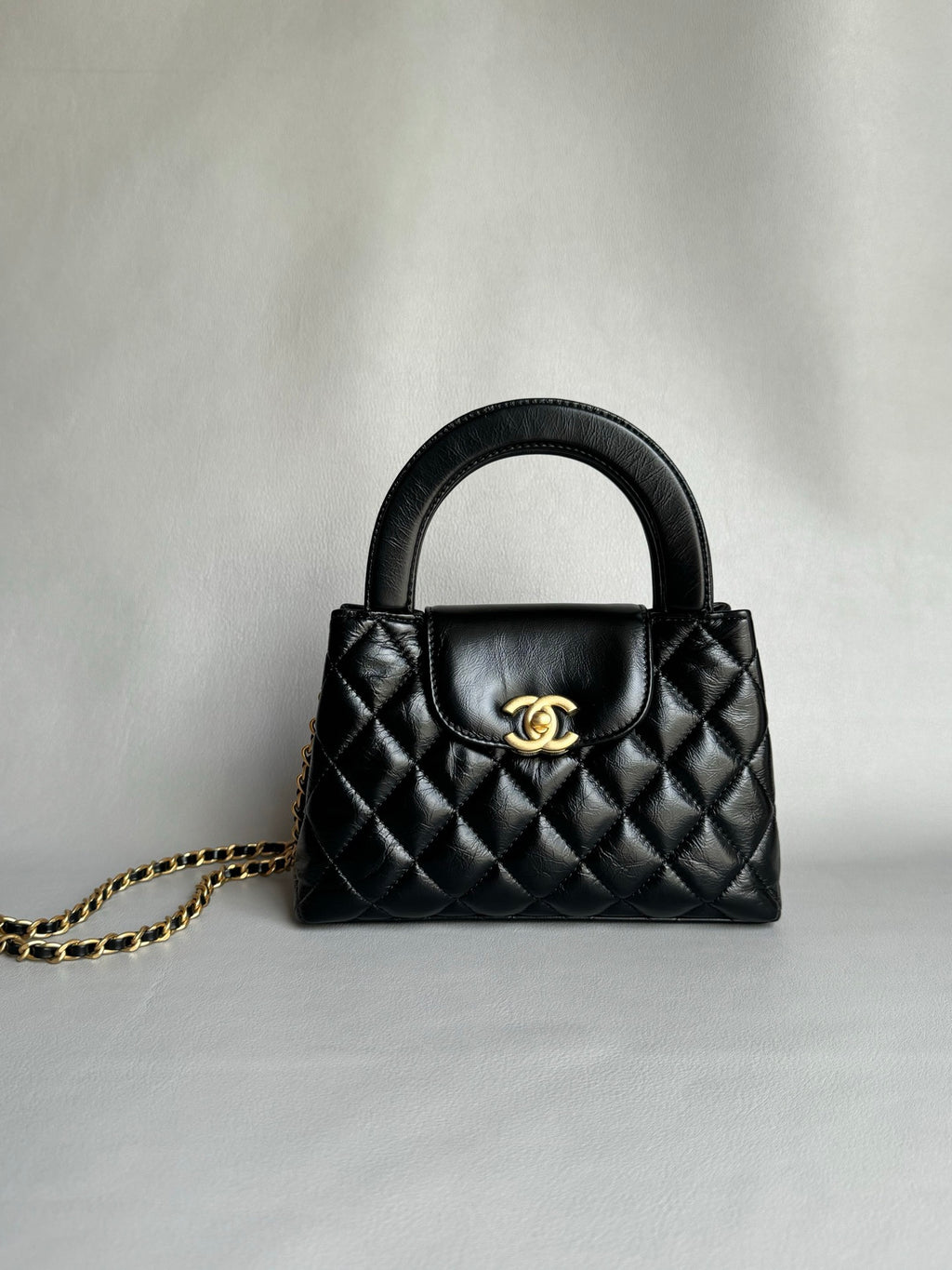CHANEL-25C kelly with handle golden/sliver