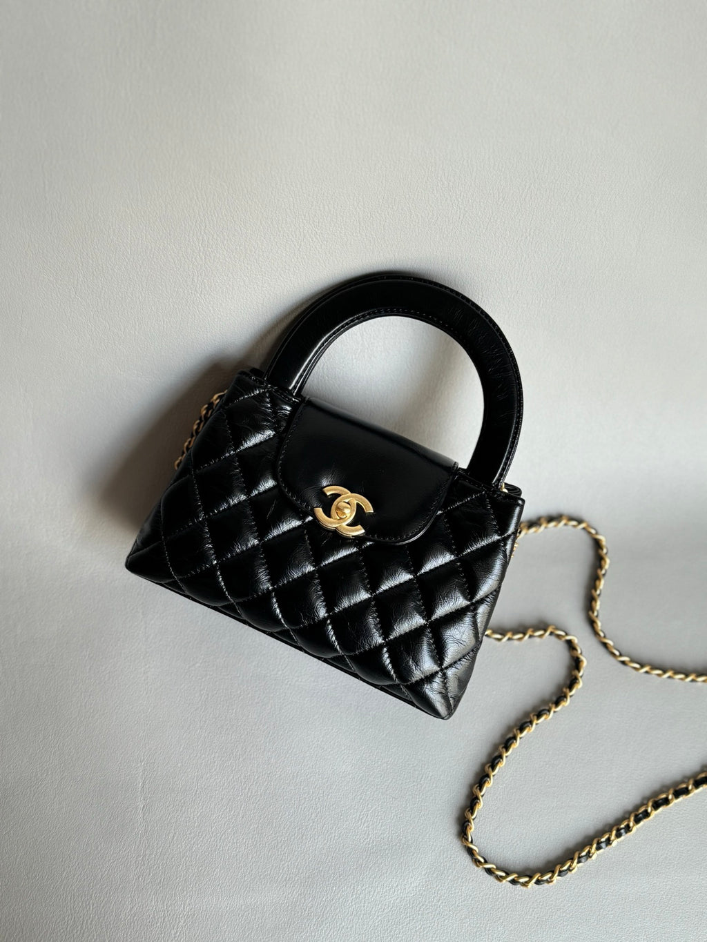 CHANEL-25C kelly with handle golden/sliver