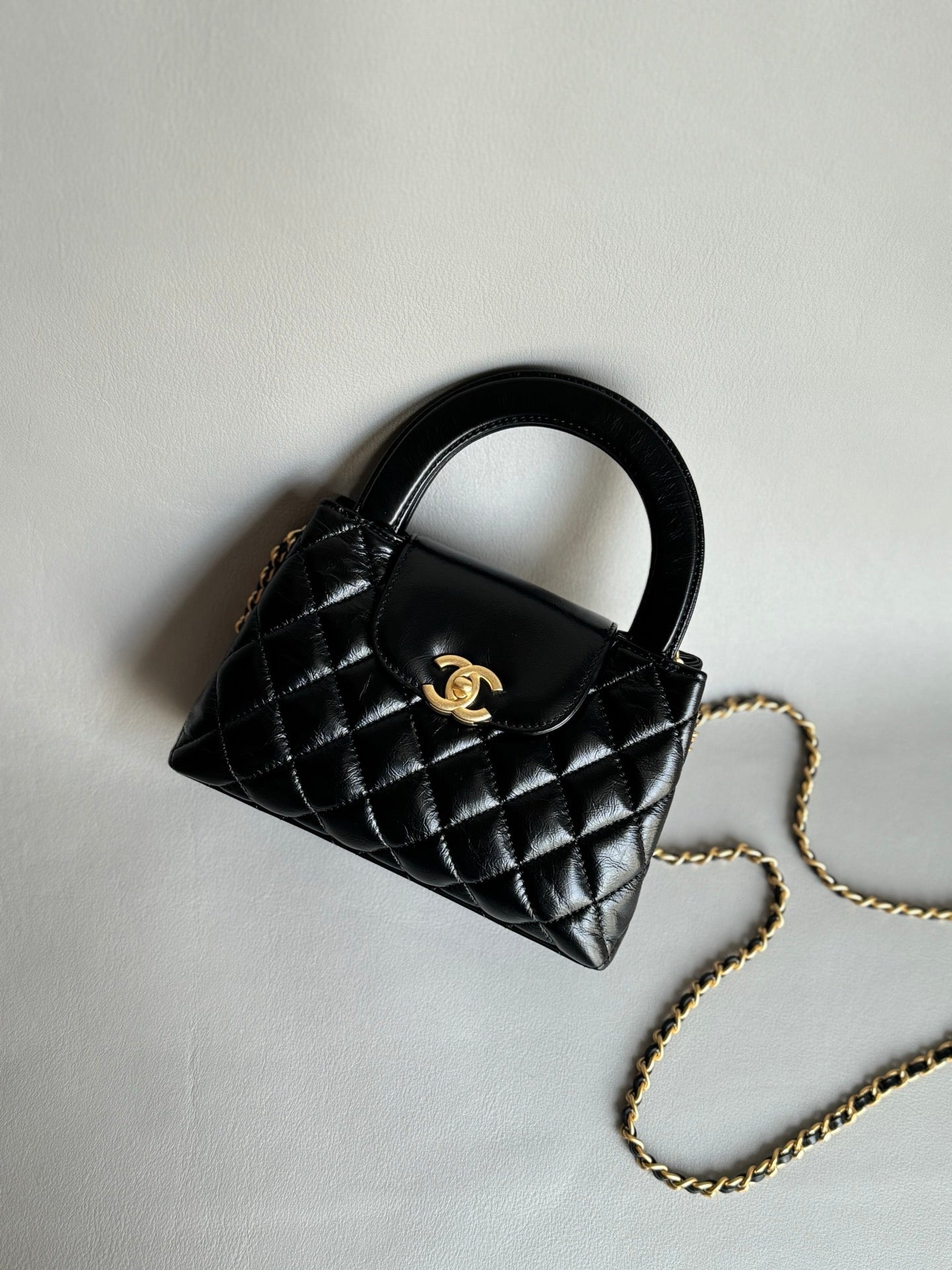 CHANEL-25C kelly with handle golden/sliver