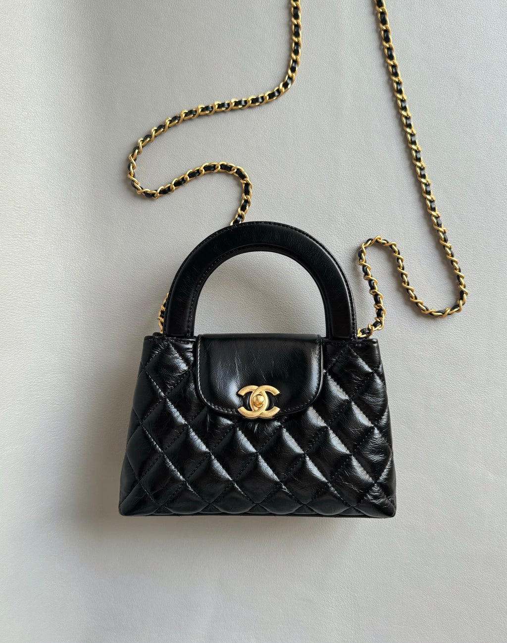 CHANEL-25C kelly with handle golden/sliver