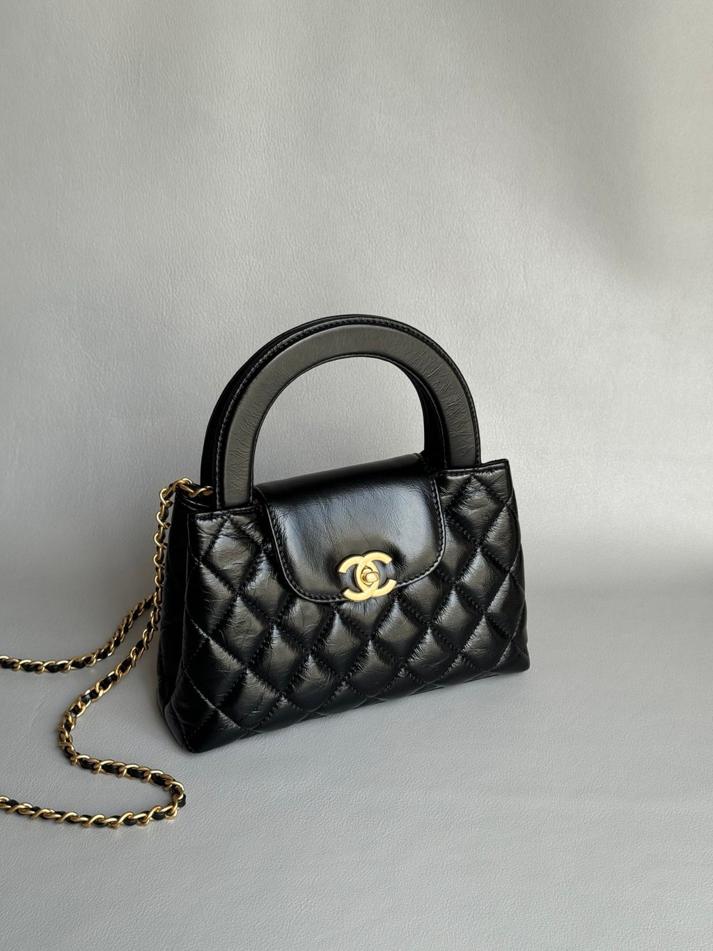 CHANEL-25C kelly with handle golden/sliver