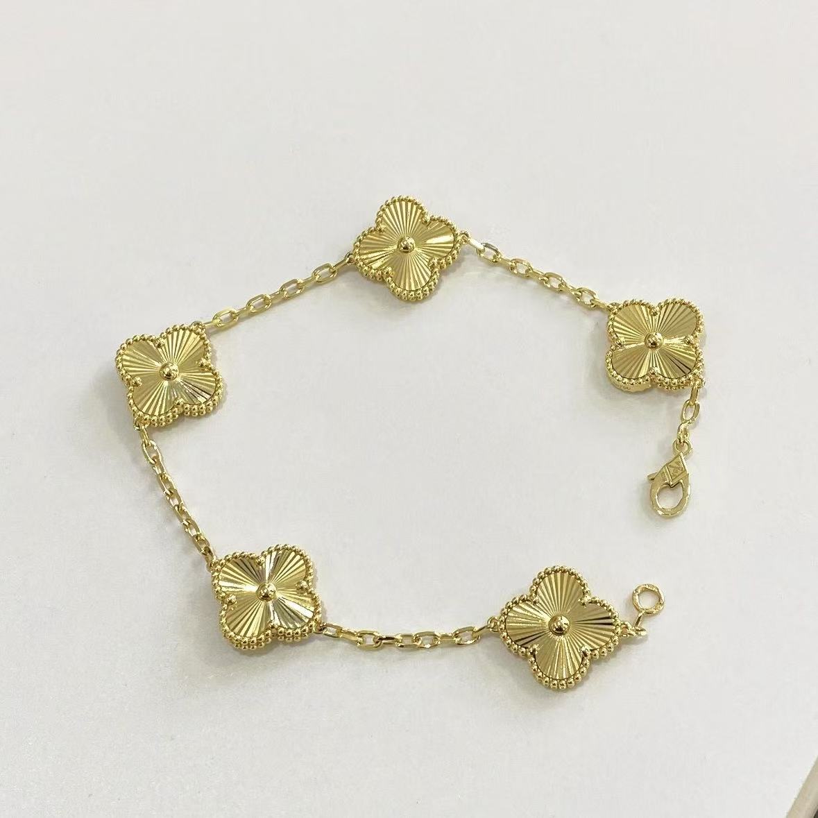 New golden  four-leaf clover five-flower set for women's diy light luxury four-leaf clover titanium steel jewelry