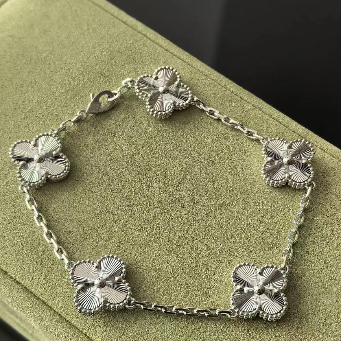 New silver four-leaf clover five-flower set for women's diylight luxury four-leaf clover titanium steel jewelry
