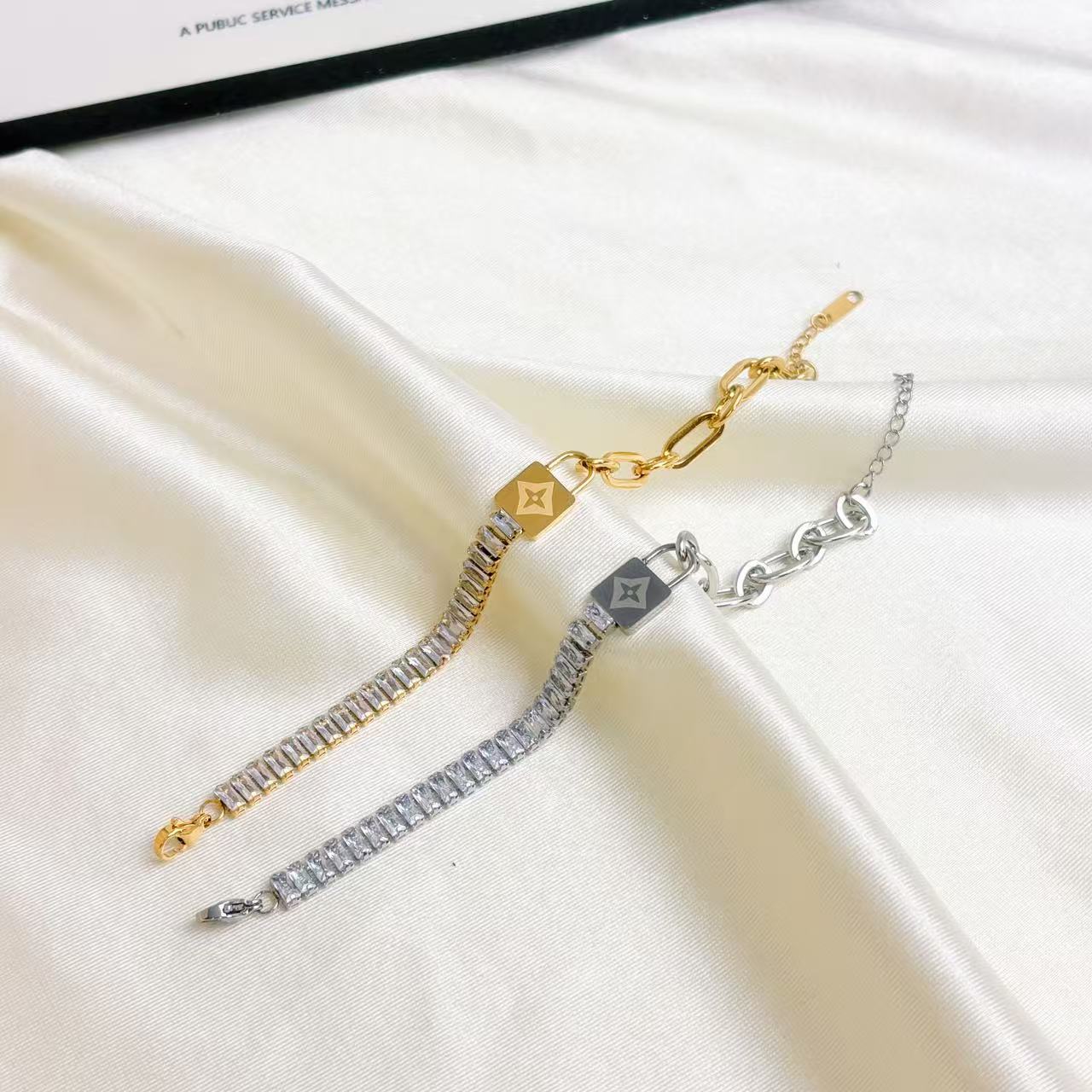 The minimalist and cold style lock bracelet features a dazzling design
