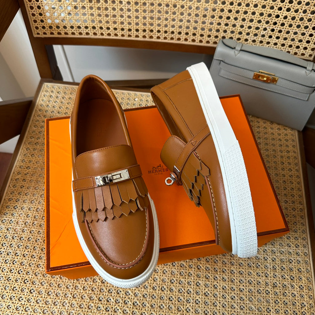 H game sliip-on sneakers fringes