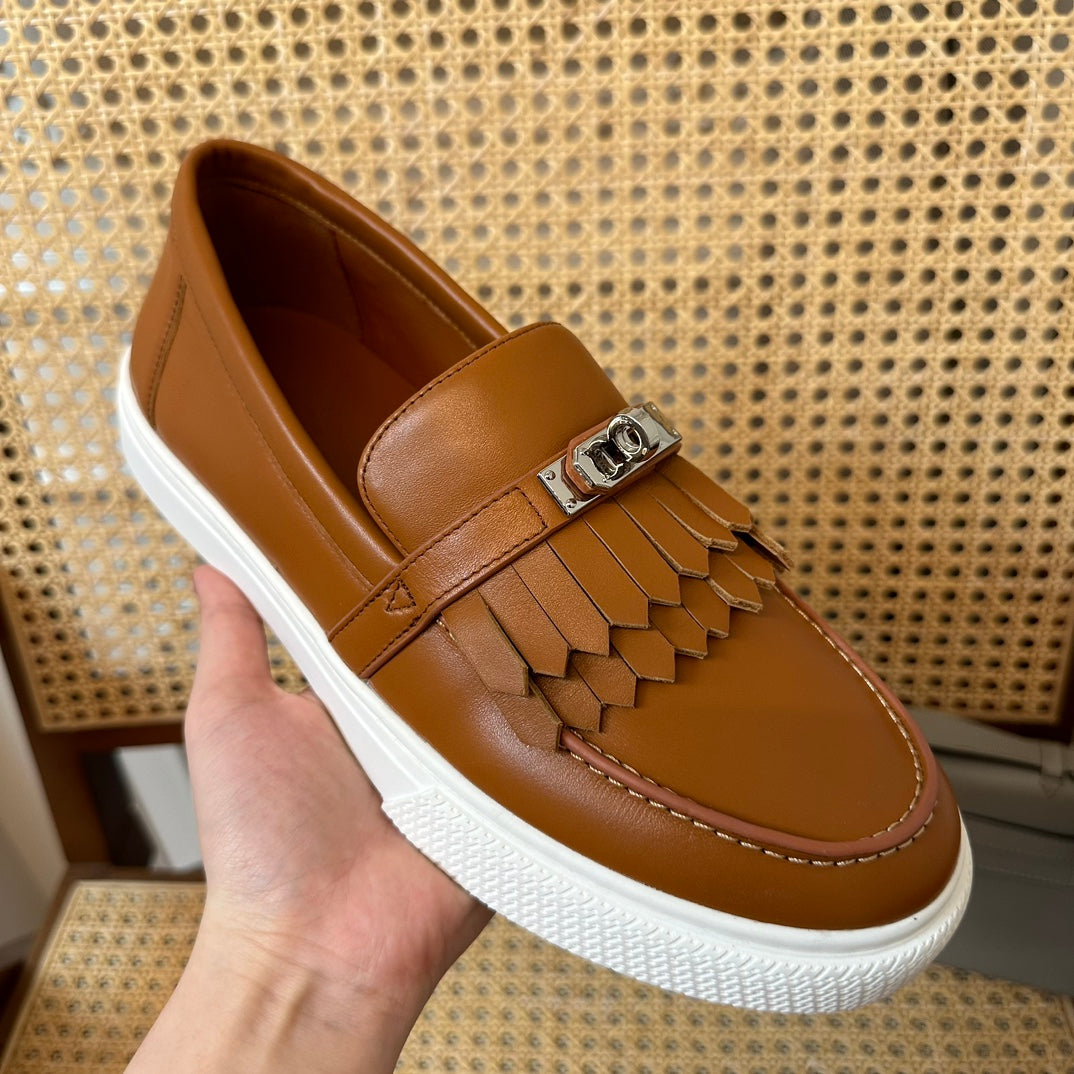 H game sliip-on sneakers fringes