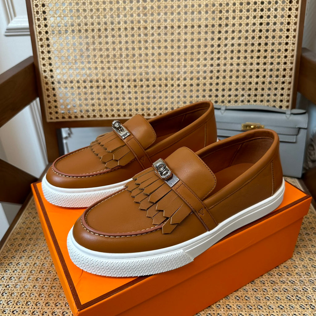 H game sliip-on sneakers fringes