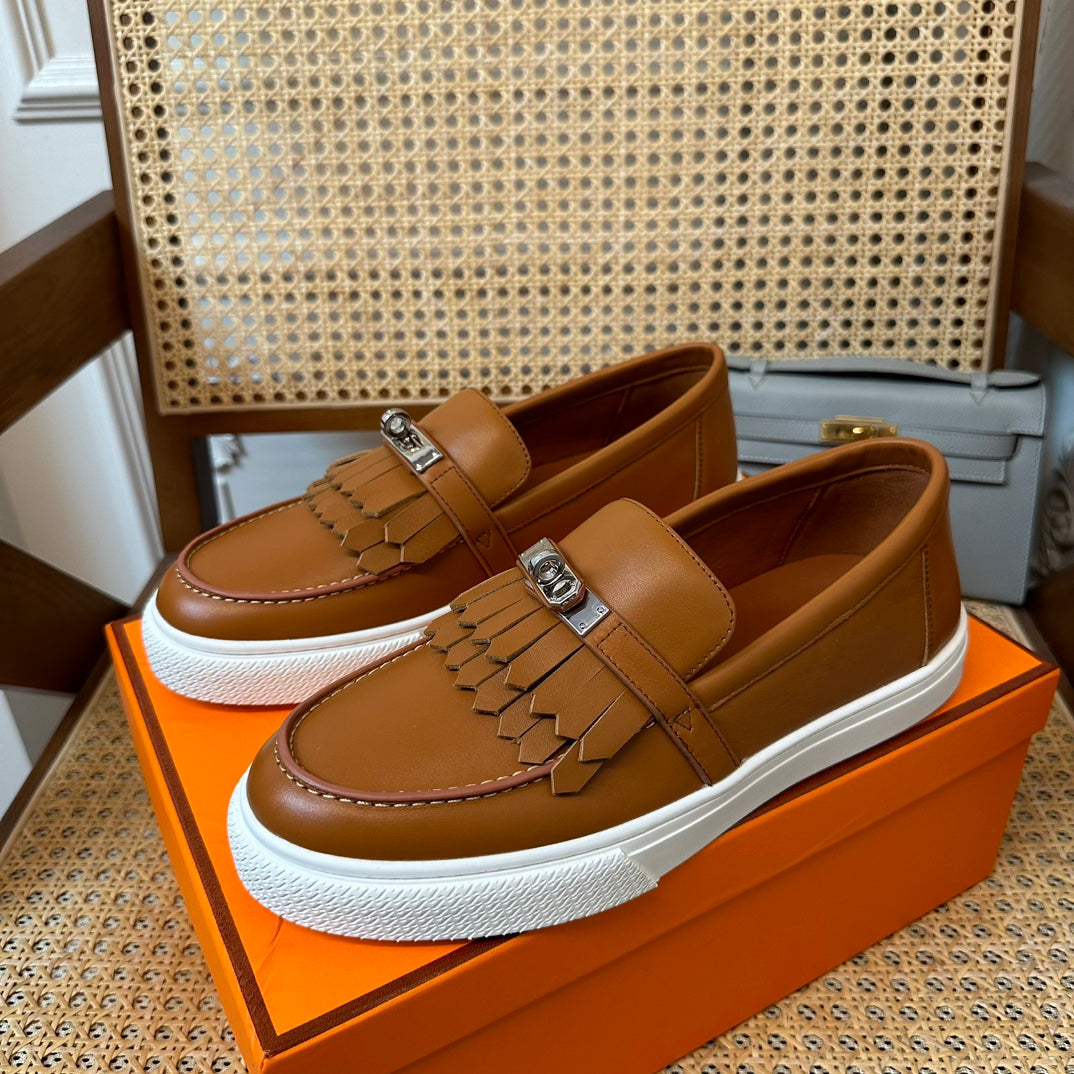 H game sliip-on sneakers fringes