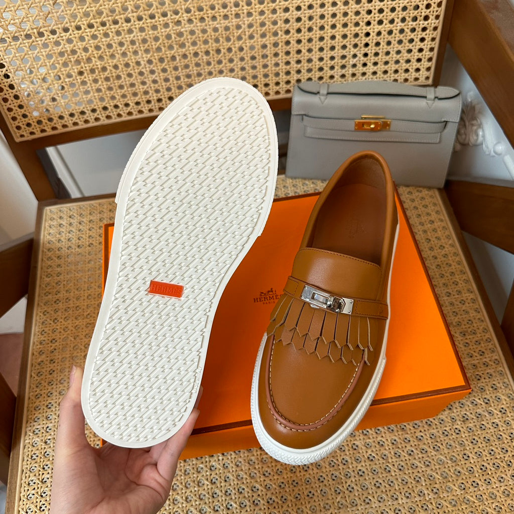 H game sliip-on sneakers fringes