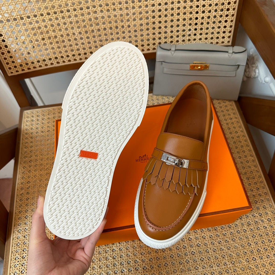 H game sliip-on sneakers fringes