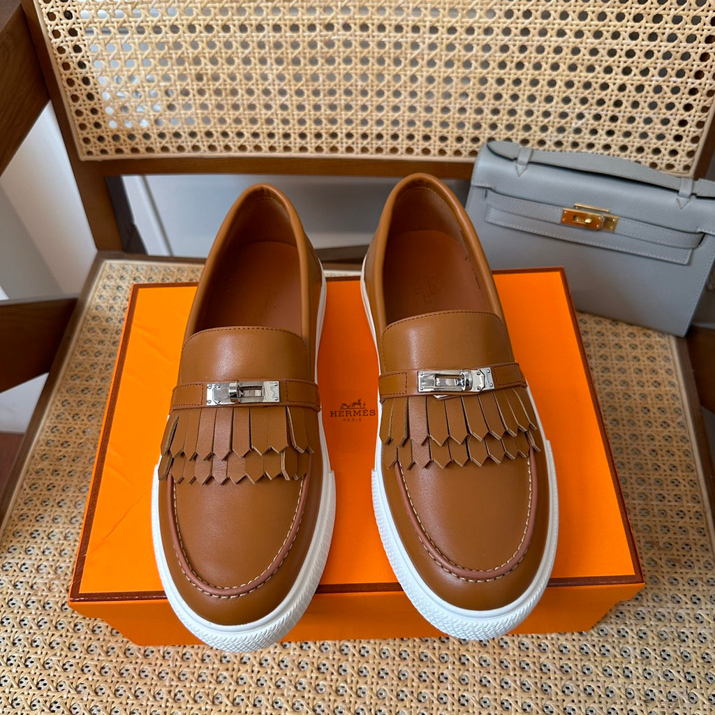 H game sliip-on sneakers fringes