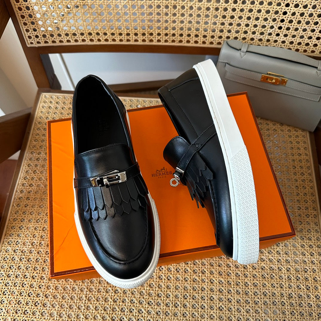 H game sliip-on sneakers fringes