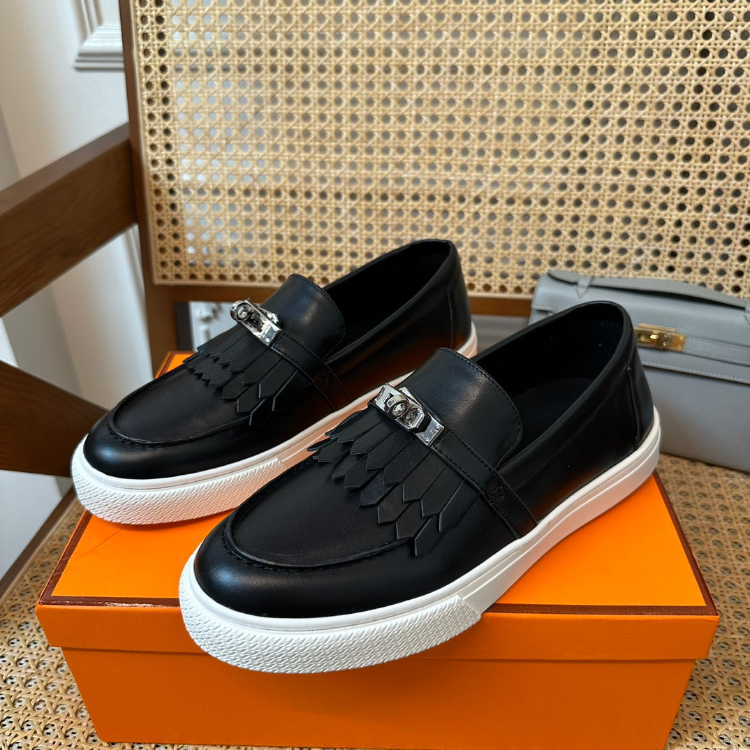 H game sliip-on sneakers fringes