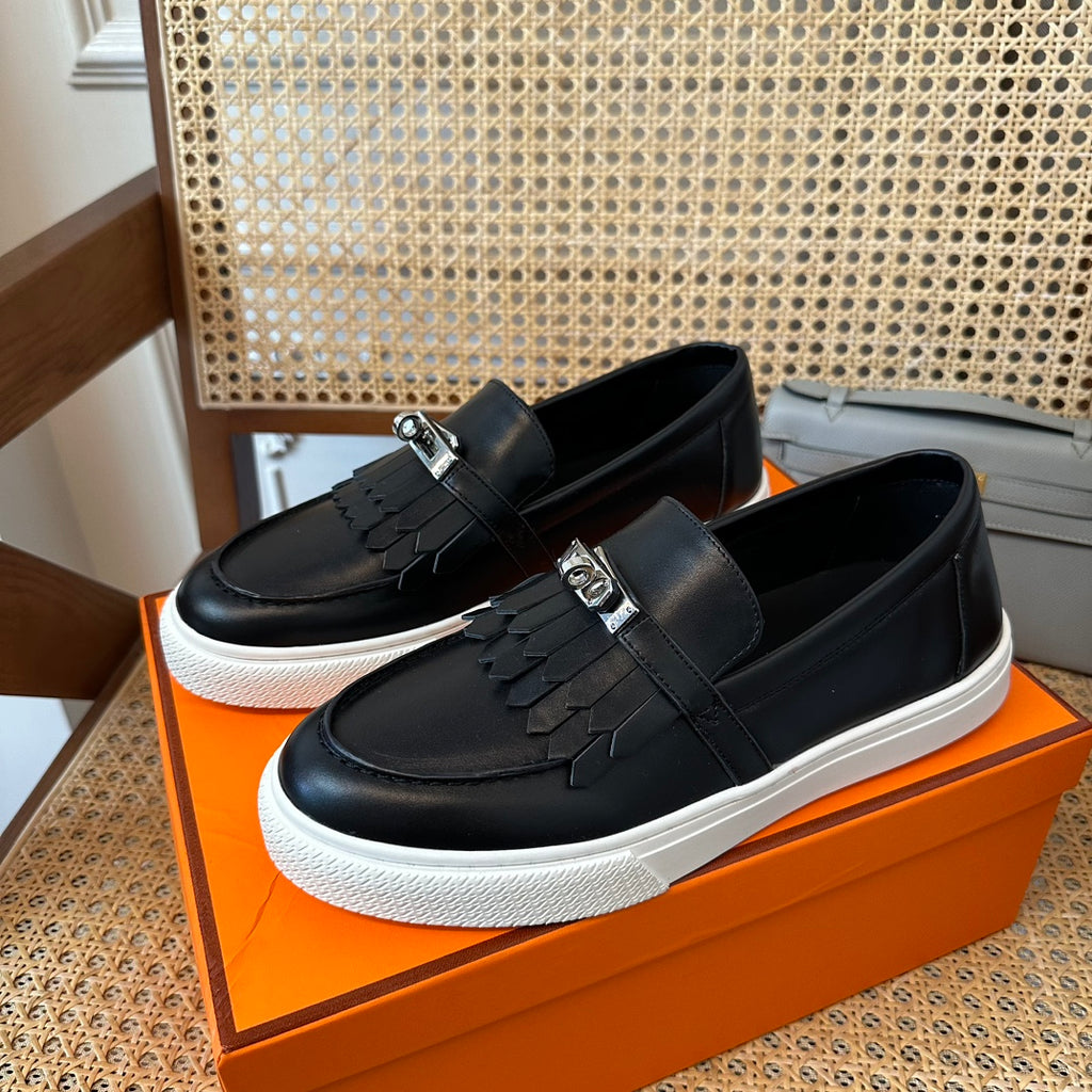 H game sliip-on sneakers fringes