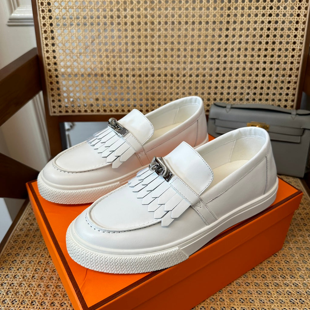 H game sliip-on sneakers fringes