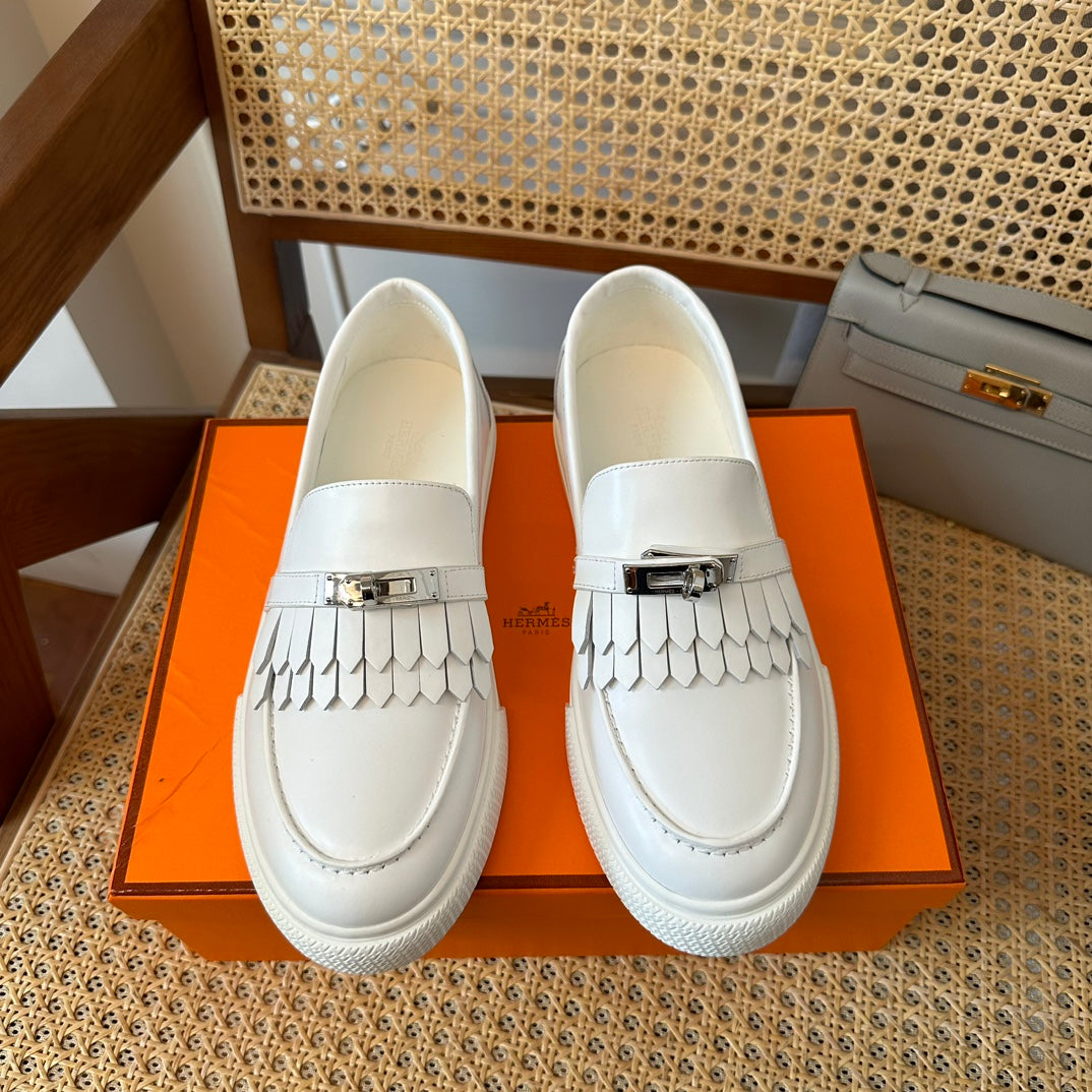 H game sliip-on sneakers fringes