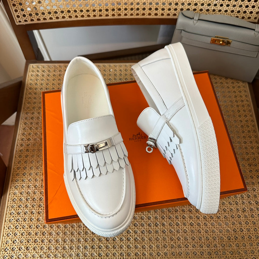 H game sliip-on sneakers fringes