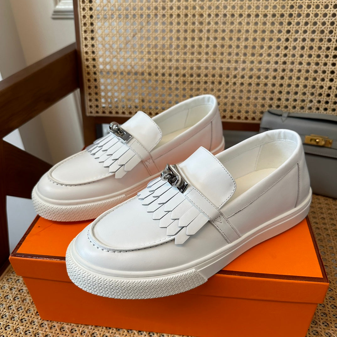 H game sliip-on sneakers fringes