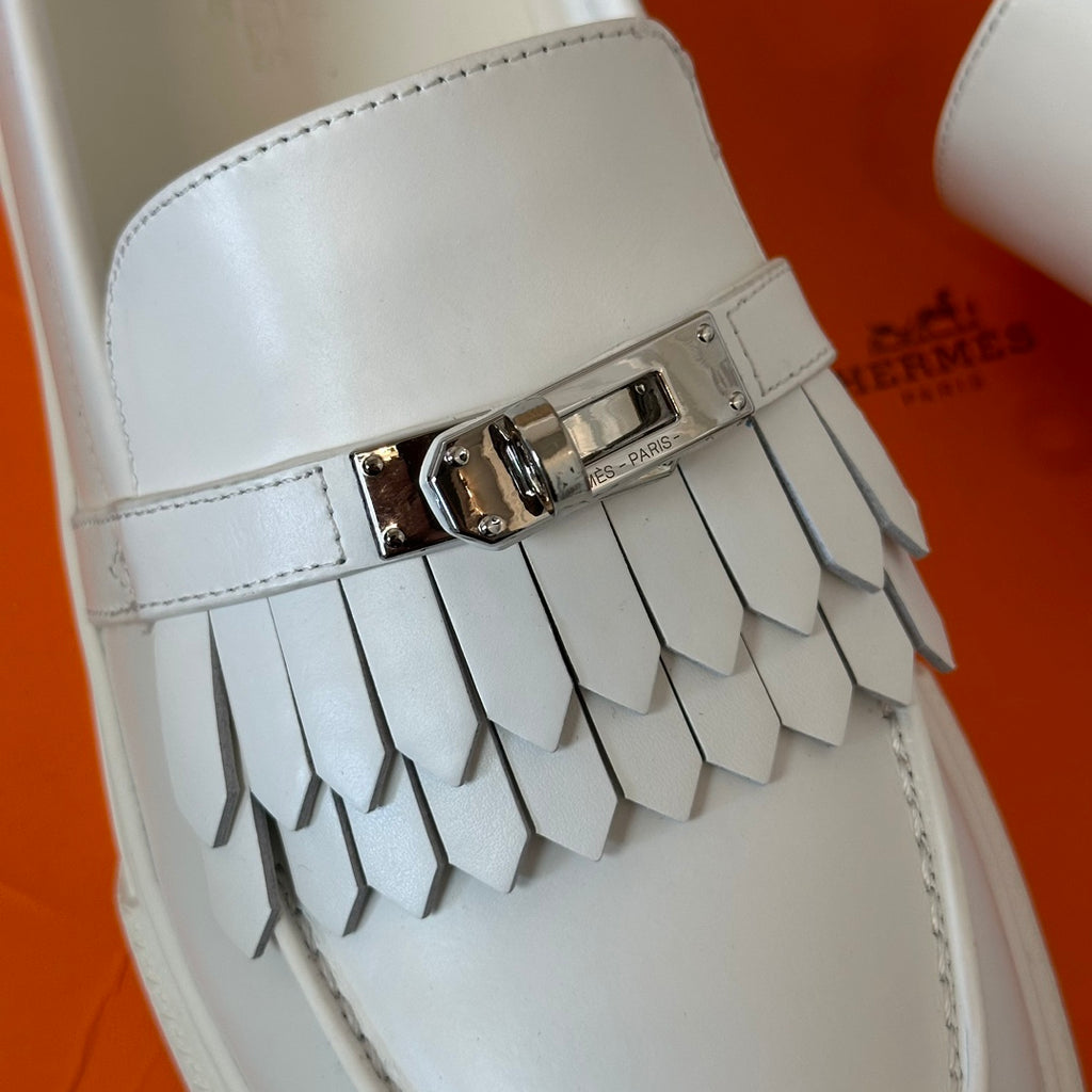 H game sliip-on sneakers fringes