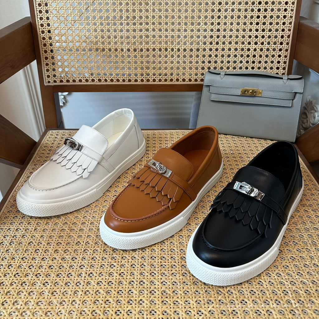 H game sliip-on sneakers fringes